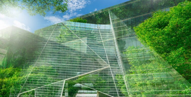 Sustainble green building. Eco-friendly building. Sustainable gl